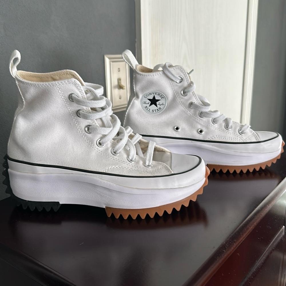 NWOT Converse high top adorable!  White size 5.5.  Never worn.